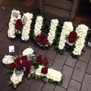 Mum Tribute with foliage and red roses